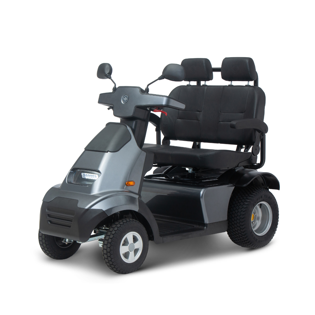 The Afikim Afiscooter S4 HD Bariatric Mobility Scooter with Dual Seat features a sleek dark gray design, two black cushioned seats, rearview mirrors, a front headlight, and large tires for unmatched all-terrain performance and stability on outdoor adventures with two passengers.